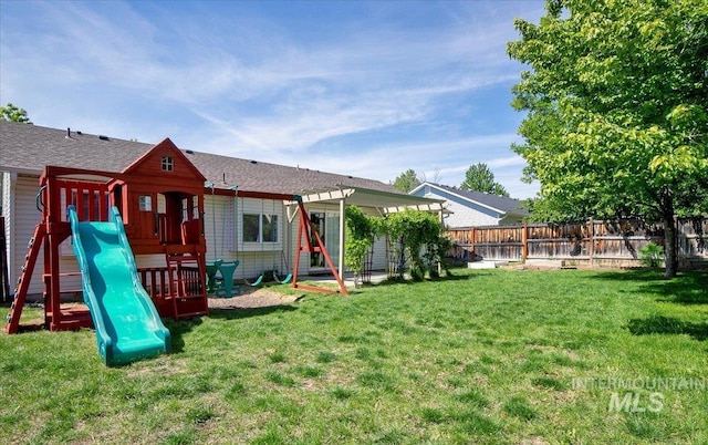 5692 S Flax Pl, Boise, ID 83716 - back of house with a playground and a pergola