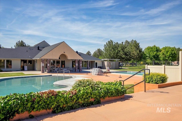 5692 S Flax Pl, Boise, ID 83716 - community pool with a patio