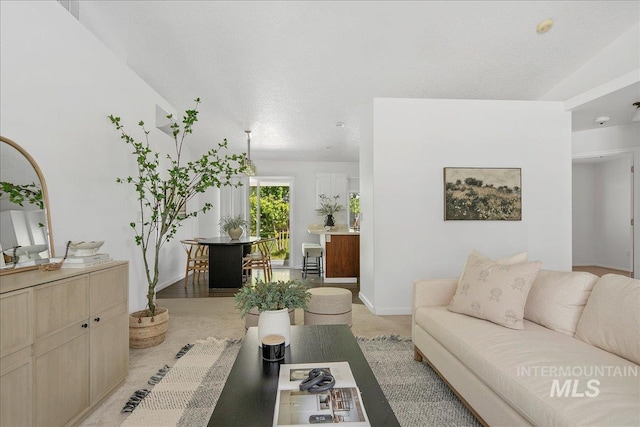 5692 S Flax Pl, Boise, ID 83716 - living area featuring light colored carpet and baseboards