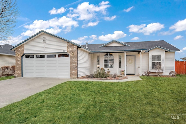 ranch-style home with a garage and a front yard