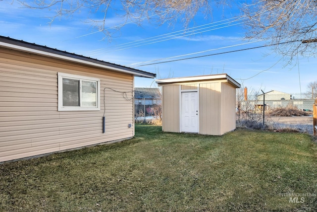 exterior space with a shed