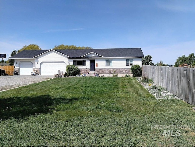 297 N 4228 E, Rigby, ID 83442 - single story home with an attached garage and driveway