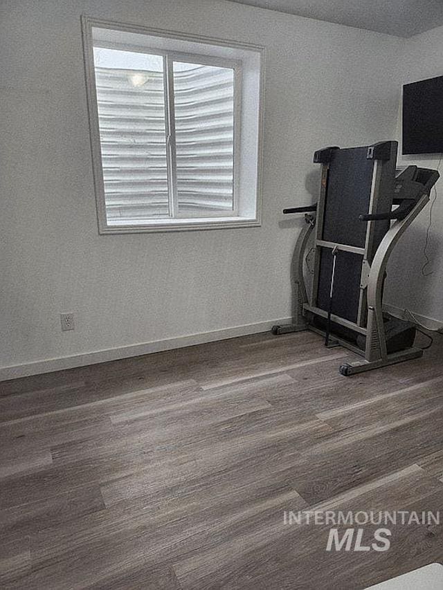 297 N 4228 E, Rigby, ID 83442 - workout room with wood finished floors and baseboards