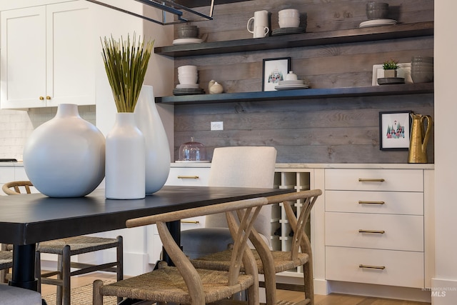 office with light wood-type flooring