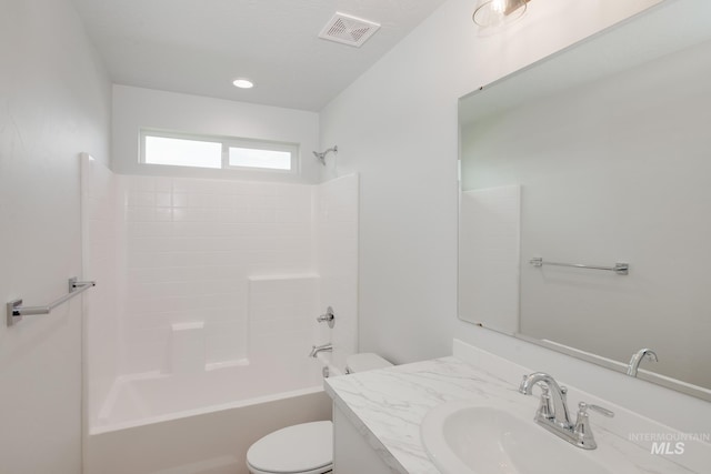 full bathroom with shower / bathing tub combination, vanity, and toilet