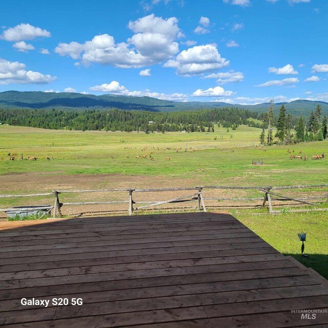 1050 Maxwell Ln, Elk City, ID 83525 - view of mountain backdrop with rural landscape, agricultural land, and a heavily wooded area