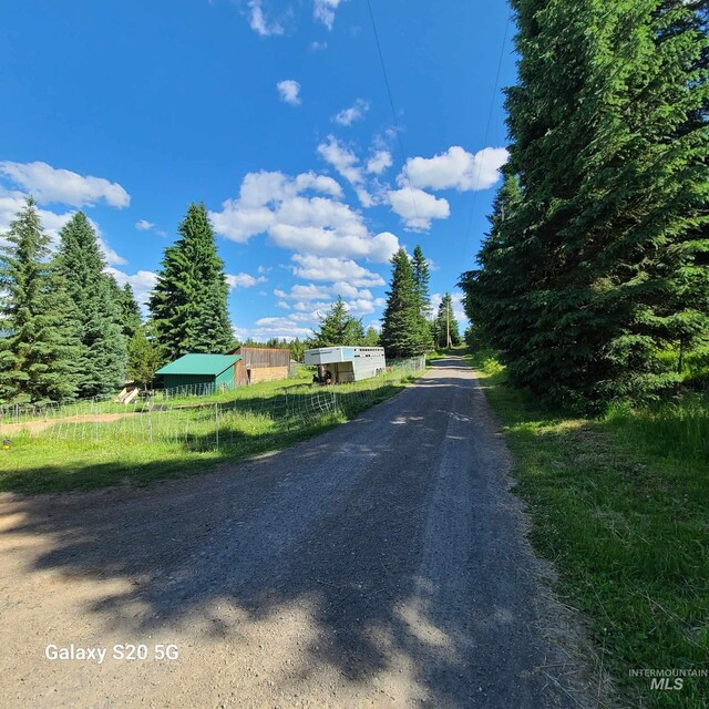 1050 Maxwell Ln, Elk City, ID 83525 - view of dirt / gravel road featuring a forest view