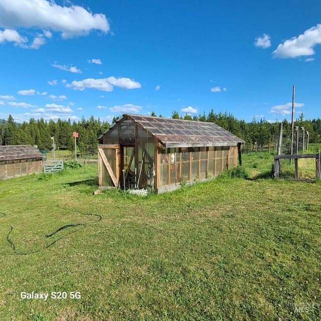 1050 Maxwell Ln, Elk City, ID 83525 - view of greenhouse with a yard