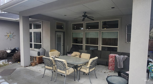 view of patio / terrace with ceiling fan and outdoor lounge area