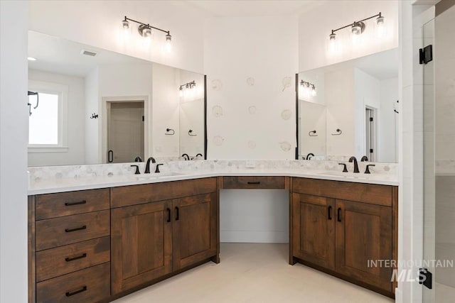 full bathroom featuring visible vents, a sink, and double vanity