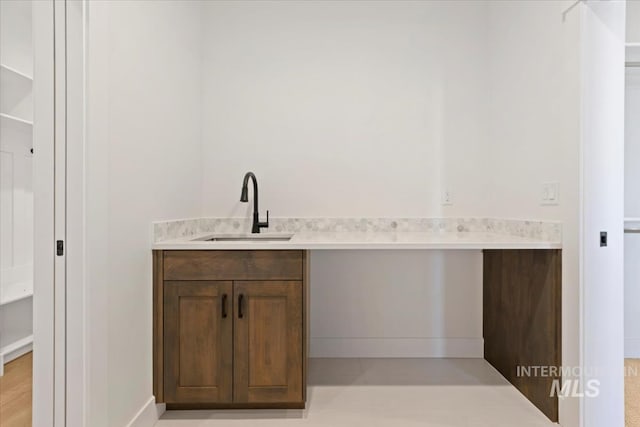 bar featuring a sink
