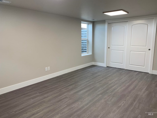 interior space featuring dark wood-type flooring