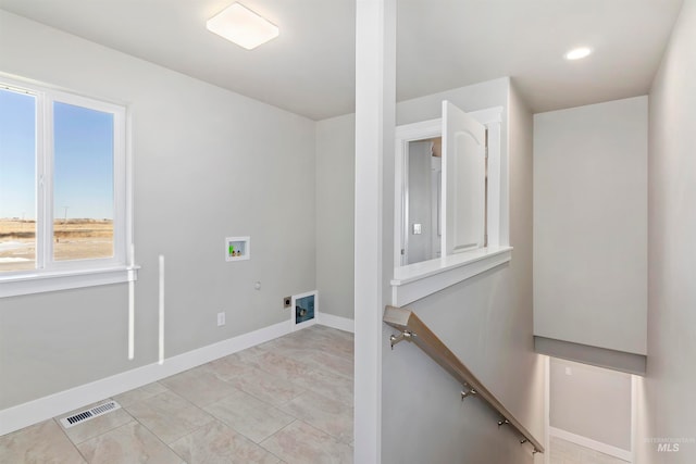 laundry area with light tile flooring, gas dryer hookup, washer hookup, and hookup for an electric dryer