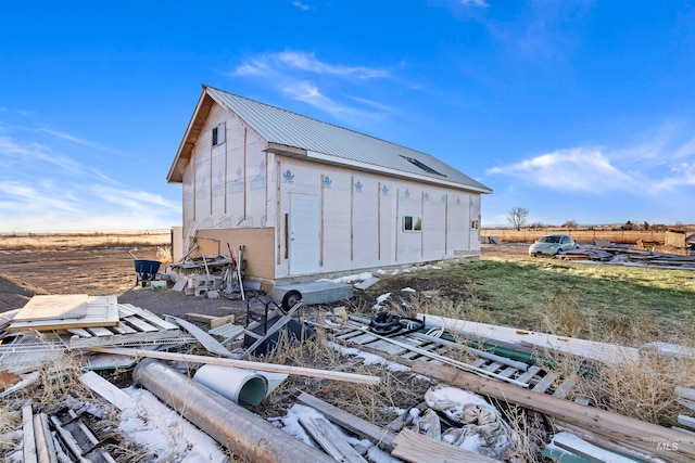 view of outdoor structure with a rural view