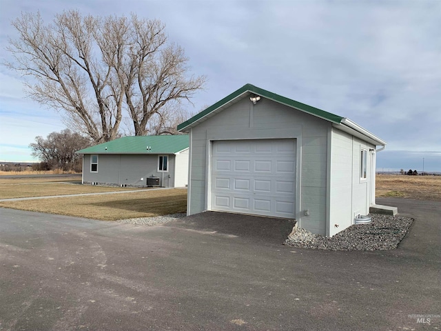 garage featuring central air condition unit