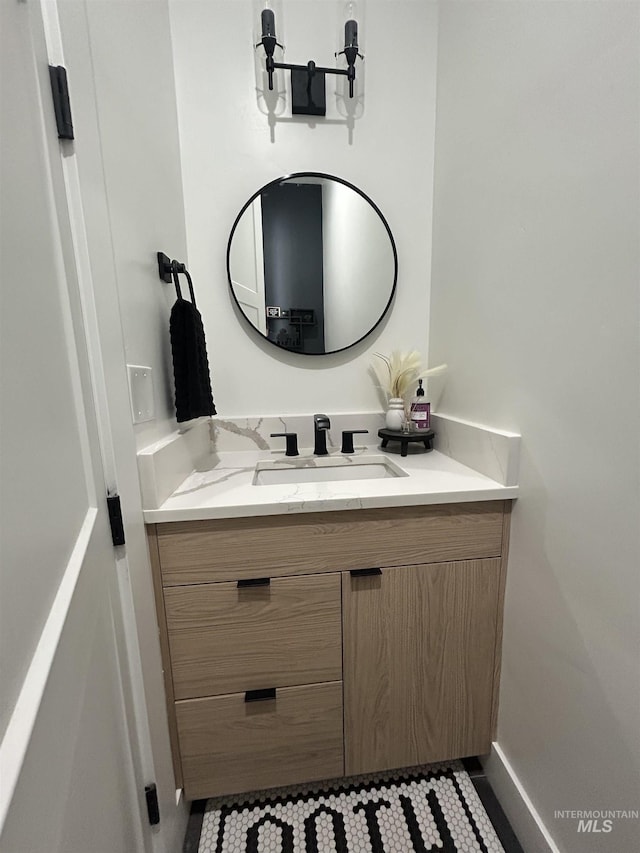 15006 Snow Mountain Dr, Caldwell, ID 83607 - bathroom featuring vanity and tile patterned flooring