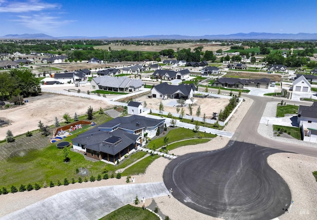15006 Snow Mountain Dr, Caldwell, ID 83607 - aerial perspective of suburban area with a mountain backdrop