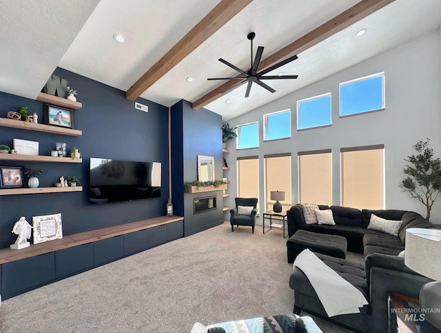 living room with carpet flooring, beamed ceiling, a ceiling fan, recessed lighting, and high vaulted ceiling
