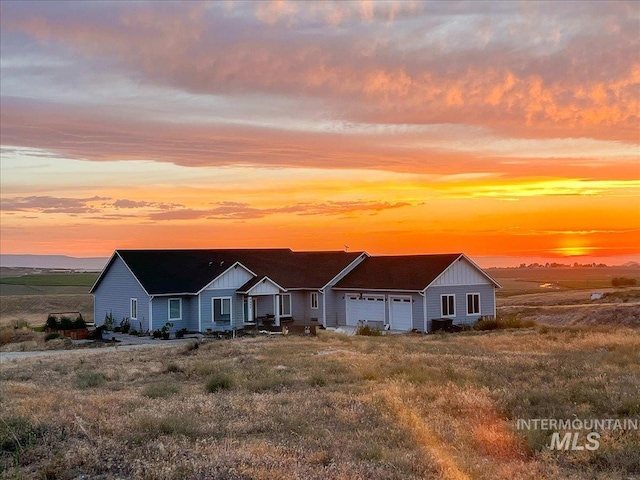 9805 Salmon Ridge Pl, Nampa, ID 83686 - view of front of home with a garage and board and batten siding