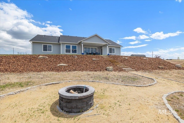 9805 Salmon Ridge Pl, Nampa, ID 83686 - single story home featuring an outdoor fire pit and stairway