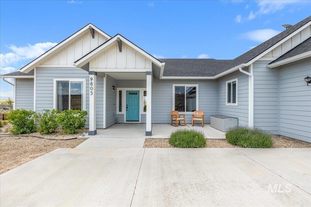 9805 Salmon Ridge Pl, Nampa, ID 83686 - view of front facade featuring board and batten siding