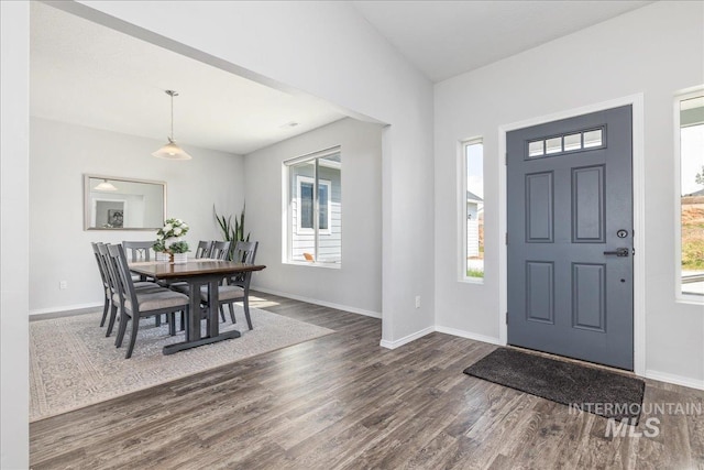 9805 Salmon Ridge Pl, Nampa, ID 83686 - foyer entrance with wood finished floors, plenty of natural light, and baseboards