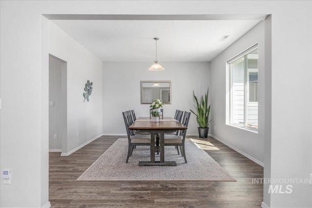9805 Salmon Ridge Pl, Nampa, ID 83686 - dining room featuring wood finished floors and baseboards
