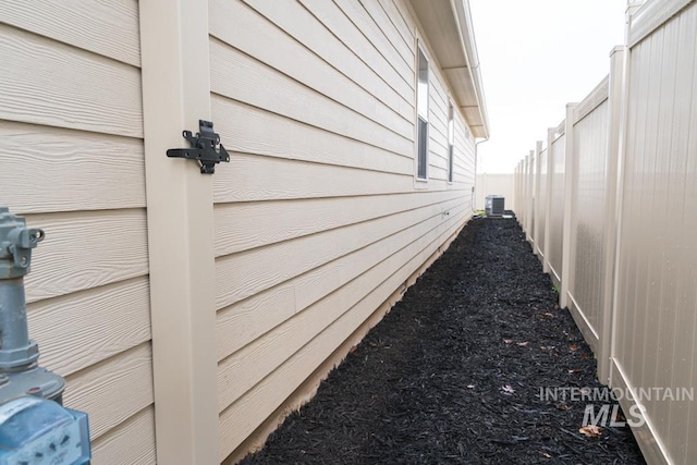 view of home's exterior featuring central AC