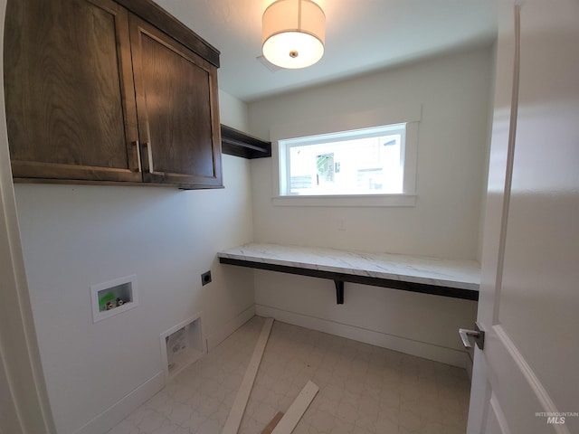laundry room featuring cabinet space, washer hookup, electric dryer hookup, baseboards, and light floors