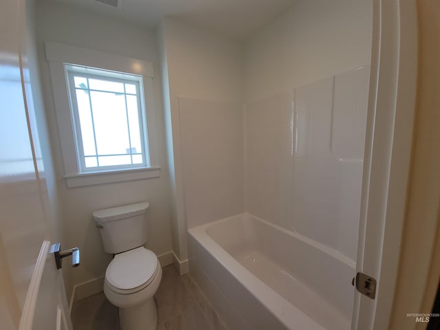 2051 E Brace St, Meridian, ID 83642 - full bathroom featuring toilet, tile patterned floors, a tub, a shower, and baseboards