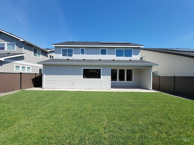 2051 E Brace St, Meridian, ID 83642 - rear view of house featuring solar panels and a patio