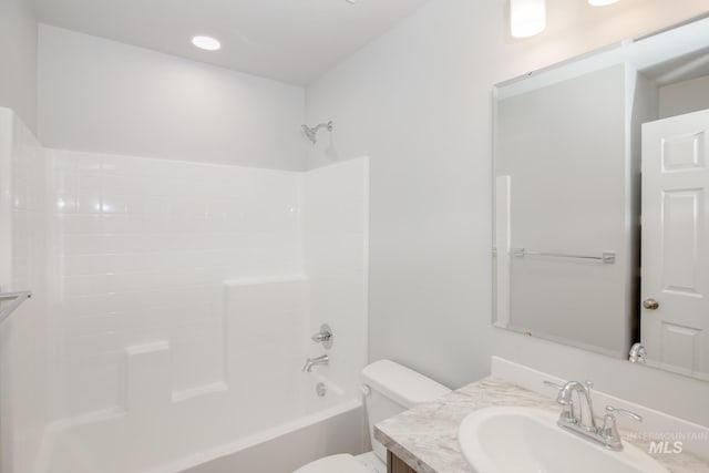 full bath featuring toilet, shower / bath combination, and vanity