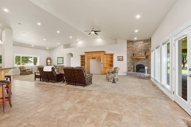 2790 S Mcdermott Rd, Nampa, ID 83687 - living room featuring a fireplace, ceiling fan, light carpet, light tile patterned floors, and recessed lighting