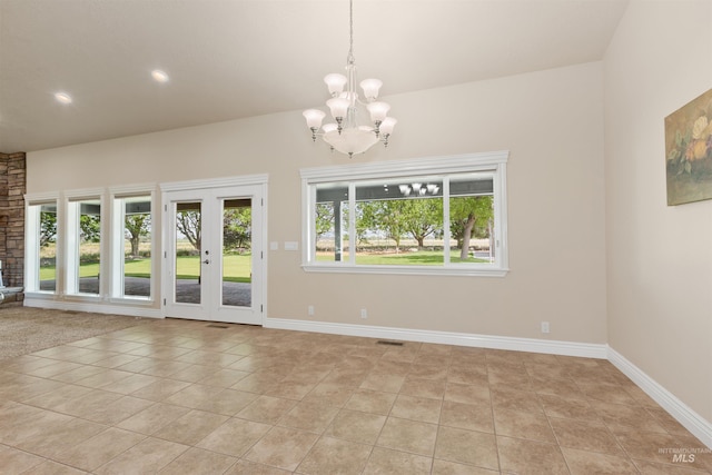 2790 S Mcdermott Rd, Nampa, ID 83687 - spare room with a chandelier, baseboards, recessed lighting, and light tile patterned floors