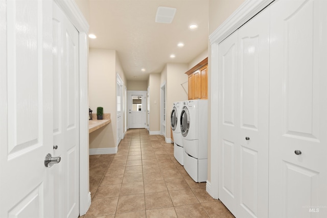 2790 S Mcdermott Rd, Nampa, ID 83687 - laundry room featuring washing machine and clothes dryer, cabinet space, baseboards, recessed lighting, and light tile patterned flooring