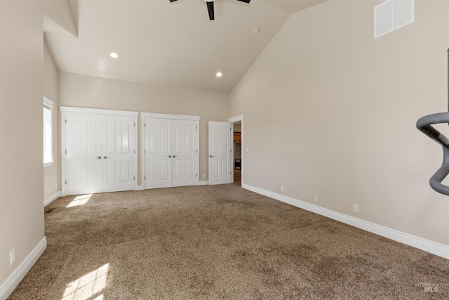 2790 S Mcdermott Rd, Nampa, ID 83687 - unfurnished bedroom featuring two closets, carpet floors, high vaulted ceiling, baseboards, and recessed lighting