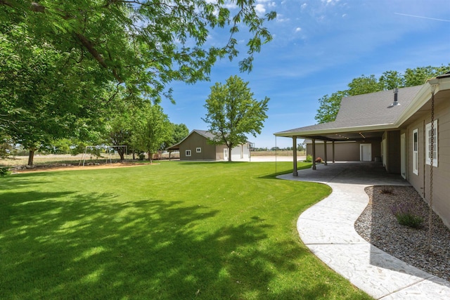 2790 S Mcdermott Rd, Nampa, ID 83687 - view of grassy yard featuring a patio and a playground