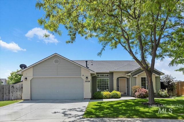 3918 Fallwood Cir, Caldwell, ID 83607 - ranch-style home with driveway, an attached garage, and roof with shingles