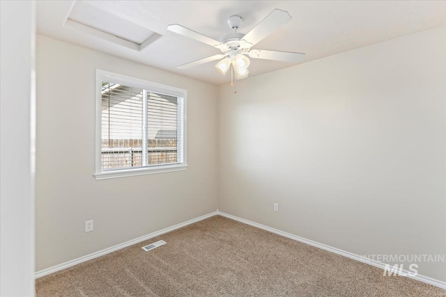 3918 Fallwood Cir, Caldwell, ID 83607 - empty room featuring attic access, carpet, and baseboards