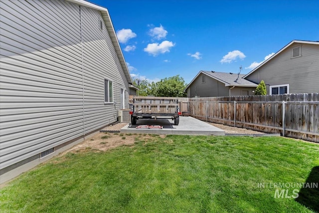 3918 Fallwood Cir, Caldwell, ID 83607 - view of yard featuring a patio and central AC