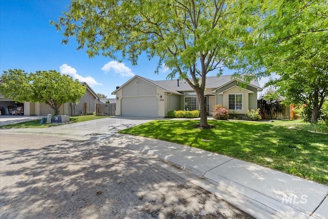 3918 Fallwood Cir, Caldwell, ID 83607 - ranch-style house featuring a garage and driveway