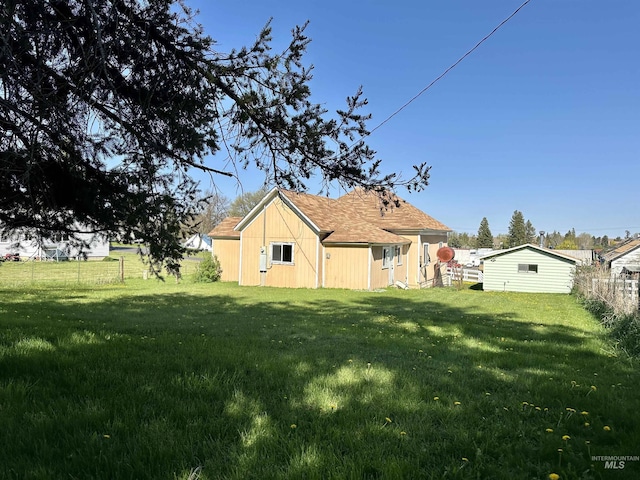408 Walnut St, Nezperce, ID 83543 - back of house with fence and a yard