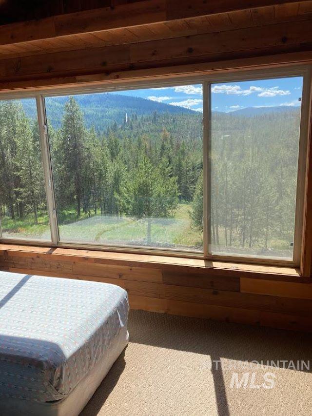 unfurnished sunroom with plenty of natural light