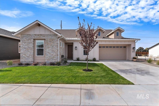 view of front of home featuring driveway, board and batten siding, a front yard, an attached garage, and brick siding