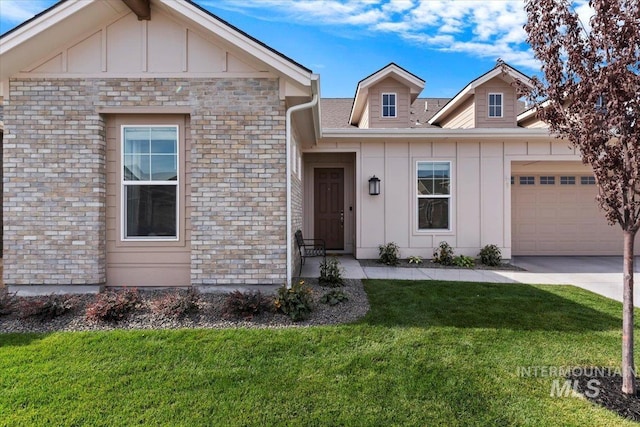 view of front of property featuring a garage, board and batten siding, concrete driveway, and a front yard