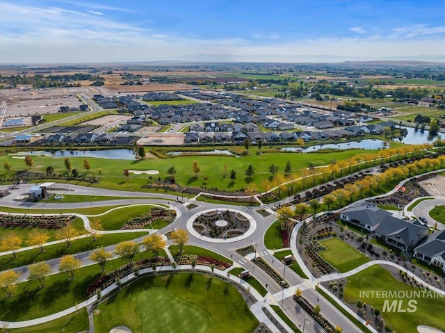 bird's eye view featuring a residential view, a water view, and view of golf course