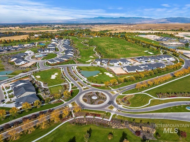 aerial view with a residential view and a mountain view