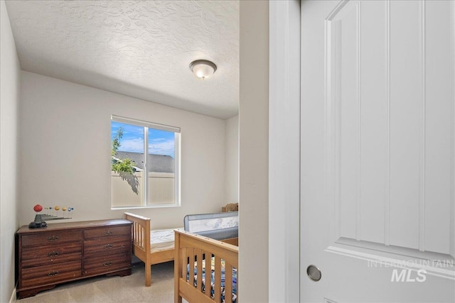 11638 W Quintale Dr, Nampa, ID 83686 - carpeted bedroom with a textured ceiling