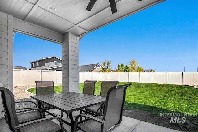 11638 W Quintale Dr, Nampa, ID 83686 - view of patio / terrace with outdoor dining space and ceiling fan