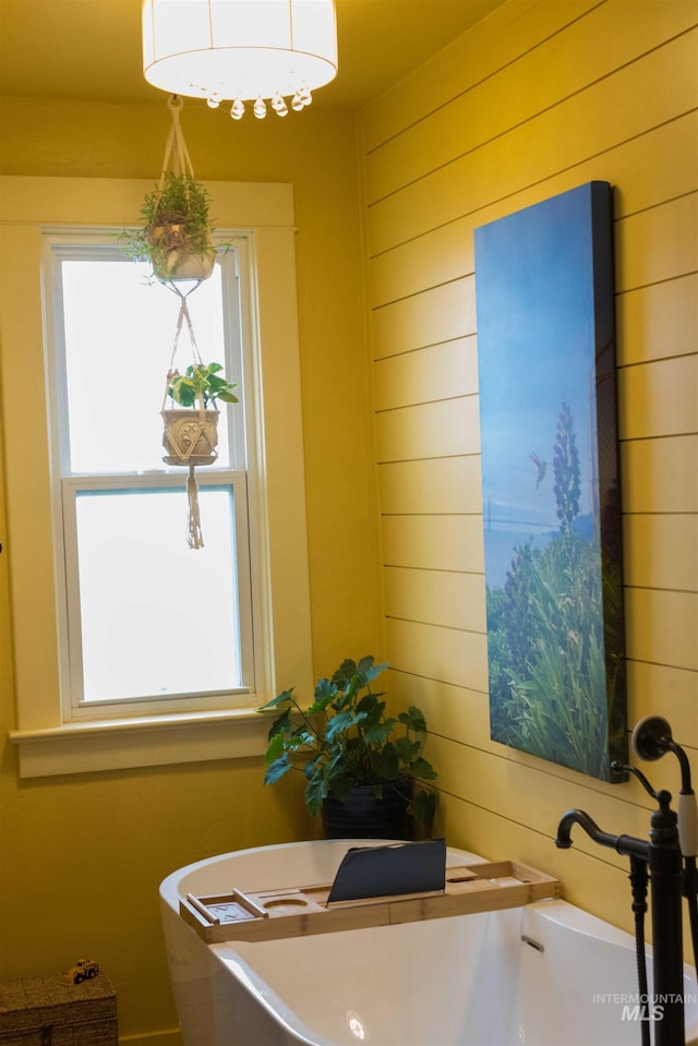 2771 S 850 E, Hagerman, ID 83332 - bathroom with healthy amount of natural light and wooden walls